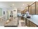 Spacious kitchen with granite countertops, stainless appliances, and ample cabinet space at 8676 Ice Wine St, Sarasota, FL 34238