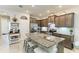 Well-appointed kitchen with granite countertops, stainless steel appliances, and ample cabinet space at 8676 Ice Wine St, Sarasota, FL 34238