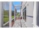 Relaxing screened-in patio for comfortable outdoor living and dining with backyard views at 8924 Misty Creek Dr, Sarasota, FL 34241