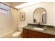 Cozy bathroom with a shower-tub combination and a dark wood vanity at 9122 16Th Avenue Nw Cir, Bradenton, FL 34209