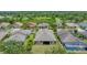 Backyard aerial view of home with screened-in porch at 9123 Raes Creek Pl, Palmetto, FL 34221