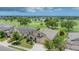 Inviting home exterior featuring a well-maintained lawn and a charming two-car garage at 9123 Raes Creek Pl, Palmetto, FL 34221