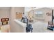 Upstairs living room boasts a comfortable seating area and large window seat at 9123 Raes Creek Pl, Palmetto, FL 34221