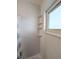 Bright white shower with built-in corner caddy and large window at 1540 Pleasant Rd # G35, Bradenton, FL 34207
