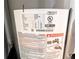 Close up of the manufacturer's label for the water heater, displaying model information and safety warnings at 1540 Pleasant Rd # G35, Bradenton, FL 34207