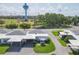 Aerial view of the property featuring carport, patio, and view of community baseball field at 1060 Cockrill St # 1060, Venice, FL 34285