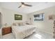 Serene bedroom featuring natural light, a comfortable bed, and neutral tones at 1060 Cockrill St # 1060, Venice, FL 34285