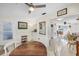 Open-concept dining area showcasing decor, lighting, and seamless flow to the living spaces at 1060 Cockrill St # 1060, Venice, FL 34285