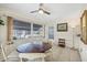 Bright dining area featuring a ceiling fan, decor, and access to the outdoors at 1060 Cockrill St # 1060, Venice, FL 34285