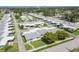 A lovely home in a well-kept neighborhood features lush greenery, a tidy lawn, and a convenient carport at 1060 Cockrill St # 1060, Venice, FL 34285