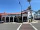 Exterior of commercial building with Sea Pleasures & Treasures on a sunny day in Venice Florida at 1060 Cockrill St # 1060, Venice, FL 34285
