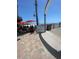 View of outdoor restaurant and entrance to the Venice Fishing Pier with ocean views at 1060 Cockrill St # 1060, Venice, FL 34285