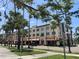 Street view with trees, buildings and businesses in Venice, Florida at 1060 Cockrill St # 1060, Venice, FL 34285