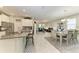 Open-concept kitchen, dining and living area, perfect for entertaining Gathering and friends at 10609 Great Cormorant Dr, Riverview, FL 33579