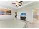 Bright main bedroom features trey ceiling, recessed lighting, and ensuite bathroom at 10609 Great Cormorant Dr, Riverview, FL 33579