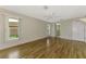 Bedroom with tile flooring, ample natural light, and an en-suite bathroom at 1144 Hoover St, Nokomis, FL 34275