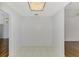 Empty room with tile flooring, neutral walls, and unique ceiling lighting at 1144 Hoover St, Nokomis, FL 34275