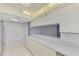 Open concept kitchen with long countertops and sleek stainless steel appliances at 1144 Hoover St, Nokomis, FL 34275
