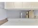 Living room featuring a pass through to the kitchen and a sliding door to the patio at 1144 Hoover St, Nokomis, FL 34275