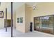 Covered patio leading out to screened-in pool at 1144 Hoover St, Nokomis, FL 34275