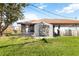 Spacious backyard featuring a shed and screened lanai, perfect for outdoor activities and relaxation at 1163 Nantucket Rd, Venice, FL 34293