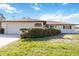 Charming single-story home with well-manicured front yard and attached garage at 1163 Nantucket Rd, Venice, FL 34293