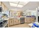Spacious kitchen featuring wood cabinets, stainless steel appliances, and plenty of counter space at 1163 Nantucket Rd, Venice, FL 34293