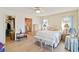 Serene main bedroom with soft colors, a large window, and an ensuite bathroom at 1163 Nantucket Rd, Venice, FL 34293