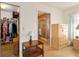 Spacious walk-in closet with plenty of storage and a view into the ensuite bathroom at 1163 Nantucket Rd, Venice, FL 34293