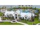 An aerial view showcasing the community pavilion, pool area, and lush landscaping at 11685 Great Brook Ln, Parrish, FL 34219
