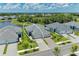 Gorgeous aerial view of home featuring professional landscaping and a spacious driveway in a well-kept neighborhood at 11685 Great Brook Ln, Parrish, FL 34219