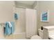 This bathroom features a toilet, shower, and towel racks and holders at 11685 Great Brook Ln, Parrish, FL 34219