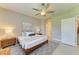 Bedroom featuring a ceiling fan, neutral tones, and modern decor at 11685 Great Brook Ln, Parrish, FL 34219
