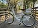 North River Ranch: White bike on a boardwalk, suggesting community amenities and recreational opportunities at 11685 Great Brook Ln, Parrish, FL 34219