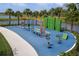 Outdoor fitness area with equipment and landscaping for a healthy community lifestyle at 11685 Great Brook Ln, Parrish, FL 34219