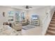 Inviting living room area with abundant natural light, perfect for relaxation and entertaining at 12564 Night View Dr, Sarasota, FL 34238