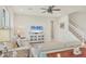 Bright living room features comfortable seating, stylish furnishings, and a decorative ceiling fan at 12564 Night View Dr, Sarasota, FL 34238