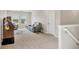 Upstairs living room featuring comfortable seating and carpeted floors, perfect for Gathering gatherings at 12564 Night View Dr, Sarasota, FL 34238