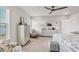 Spacious main bedroom featuring a lake view window, soft lighting, and comfortable furnishings at 12564 Night View Dr, Sarasota, FL 34238