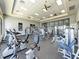 Well-equipped gym with modern exercise machines and a view of the outdoors at 138 Toscavilla Blvd, Nokomis, FL 34275