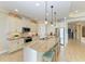 Kitchen with granite countertops, stainless steel appliances and a spacious layout at 138 Toscavilla Blvd, Nokomis, FL 34275