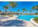 Gorgeous community pool with plenty of space for lounging and relaxing and views of the waterfront at 138 Toscavilla Blvd, Nokomis, FL 34275