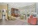 Beautiful dining area with wood floors and French doors, bathed in natural light at 140 Sugar Mill Dr, Osprey, FL 34229