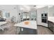 Spacious kitchen features modern appliances, a large island, and ample cabinet space at 140 Sugar Mill Dr, Osprey, FL 34229