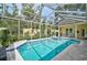 Beautiful pool and spa are screened in, set amidst lush landscaping, and offer a serene escape at 140 Sugar Mill Dr, Osprey, FL 34229