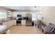 Bright kitchen with stainless appliances, white cabinets, granite countertops and tile flooring at 152 Coolidge Dr, Sarasota, FL 34236