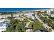 Charming coastal community with beachfront access and lush green landscaping near beautiful beaches at 160 Coolidge Dr, Sarasota, FL 34236