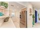 Bright kitchen with stainless steel appliances and ample counter space for meal preparation with modern finishes at 160 Coolidge Dr, Sarasota, FL 34236