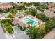 Aerial view of community pool and clubhouse with surrounding landscaped grounds at 16531 Kendleshire Ter, Lakewood Ranch, FL 34202