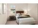 Inviting bedroom with a plush bed, stylish nightstands, and a bright window at 16531 Kendleshire Ter, Lakewood Ranch, FL 34202